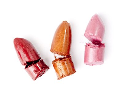 lipstick samples cut on white background