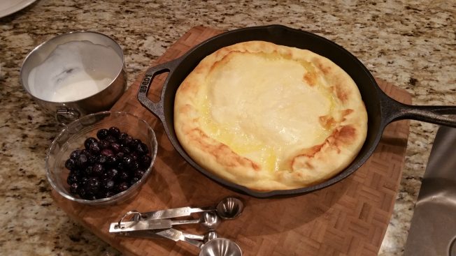 Finished German style pancake right out of the oven, looking perfect.